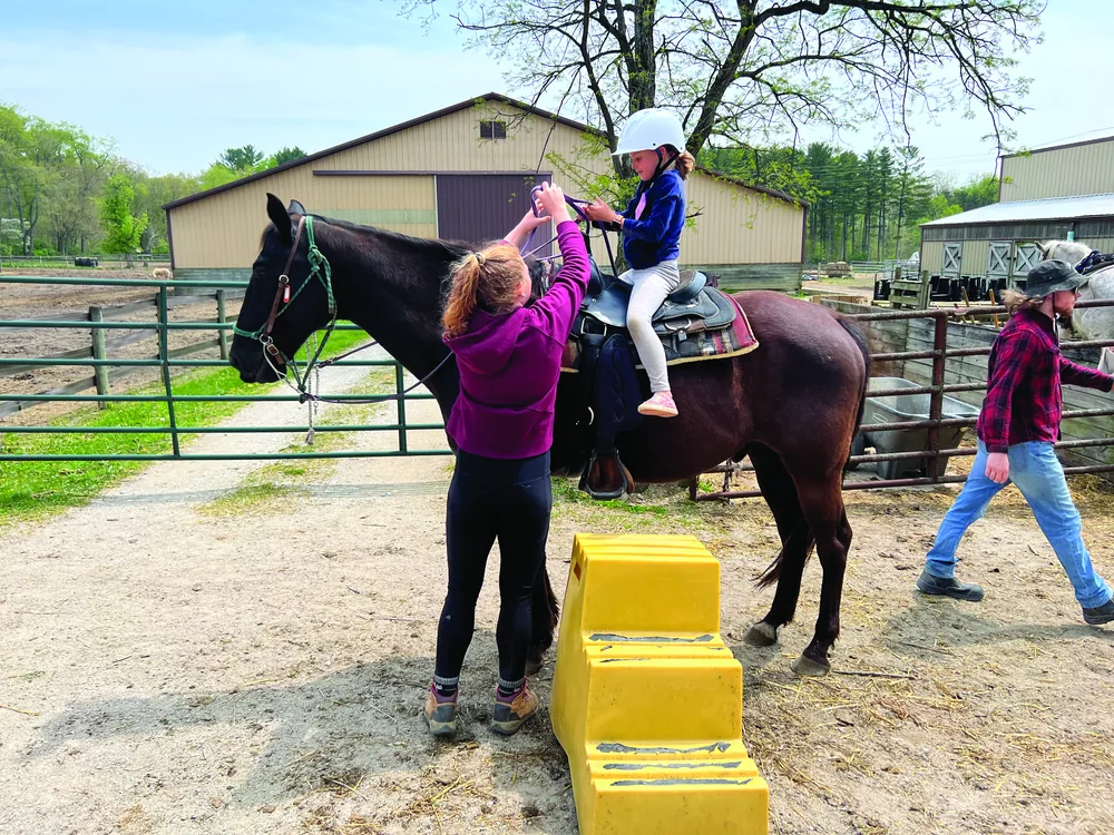 Child horseback riding